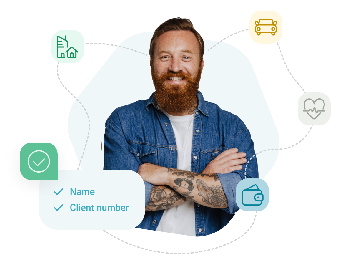 A man with a beard wearing a jeans jacket is looking straight at the screen with his arms crossed over his chest